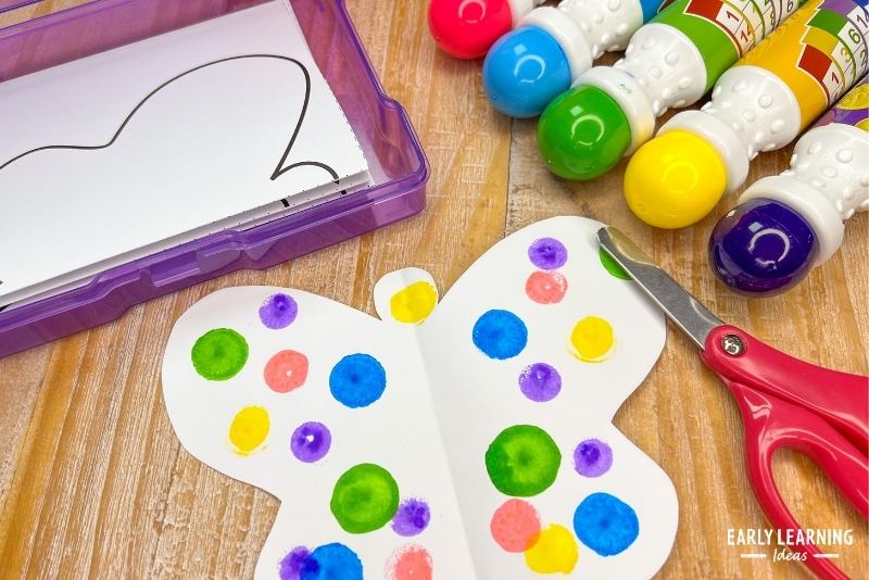 fold and cut butterfly craft decorated with dot markers