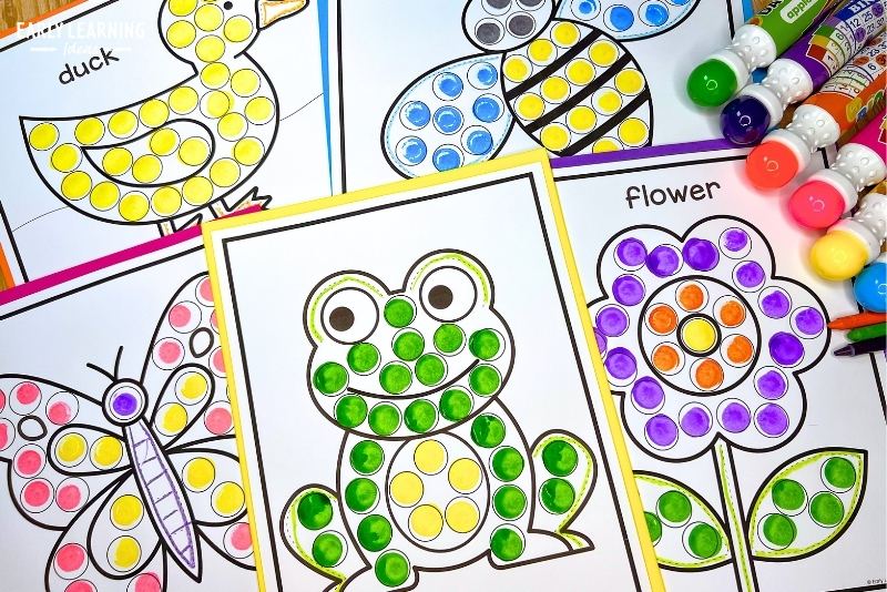 A set of spring dot marker coloring pages shown with dot markers or bingo daubers - pages include a duck, bee, butterfly, frog, and flower dot marker coloring sheets.
