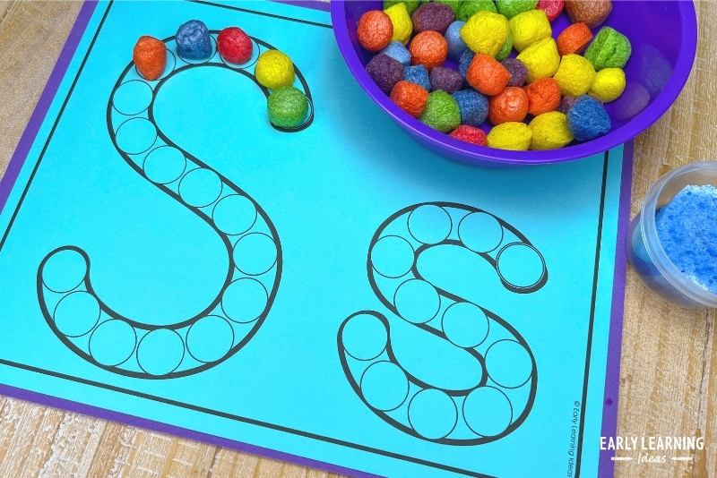 A letter s dot letter page is shown with colorful craft noodles.