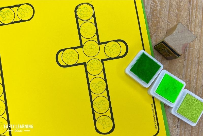 a turtle stamp is used on a letter t dot letter printable