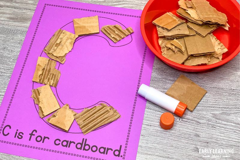 alphabet c is for cardboard craft activity.  Torn cardboard is glued to a letter c printable craft page