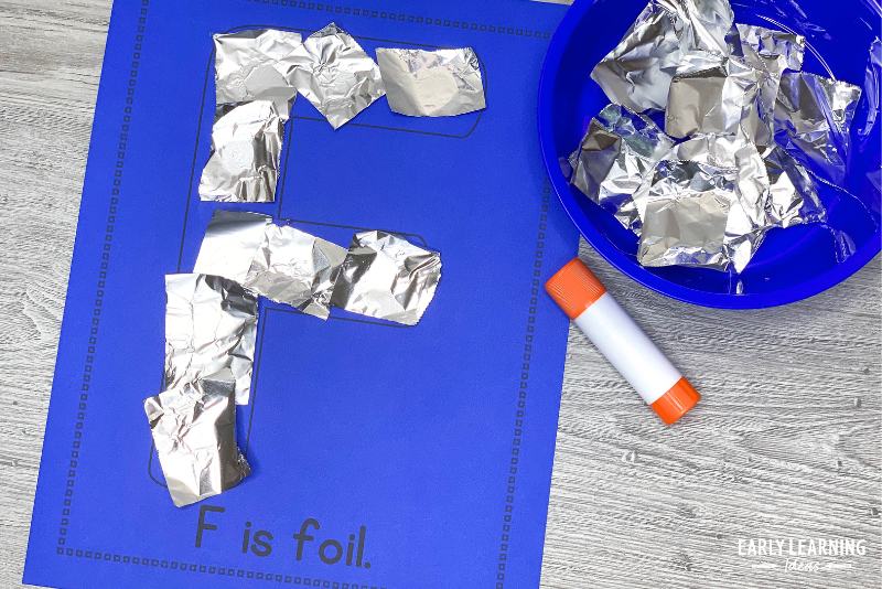 letter f is for foil alphabet activity printable.  Small pieces of foil are glued to the letter f on the printable page