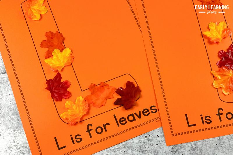 Letter l is for leaves alphabet activity.  Silk leaves are glued to the large bubble letter l on each page.