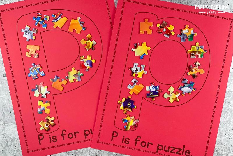 Letter p is for puzzle craft activity page.  Small puzzle pieces are glued to the large letters on the printable craft activity page.