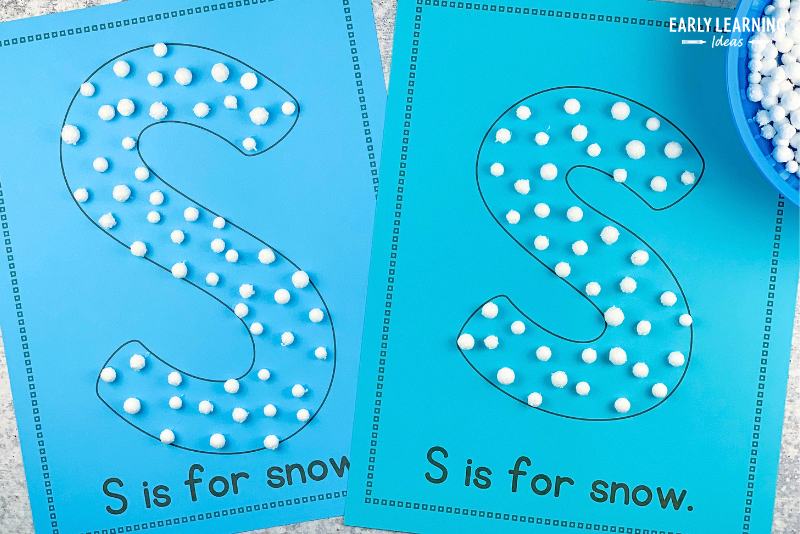 S is for snowflake alphabet activity.  Small pom poms are glued to the letter s on each printable letter page
