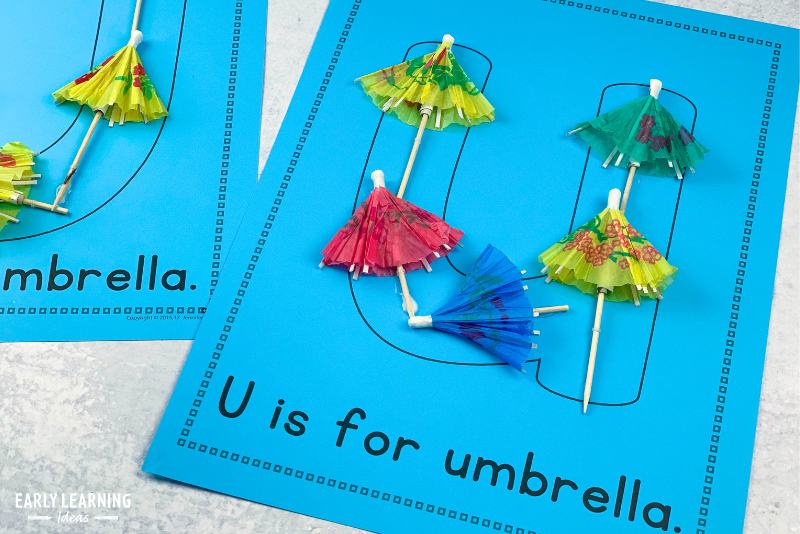 Letter u is for umbrella collage activity.  Small drink umbrellas are glued to the large letter u on each printable page.