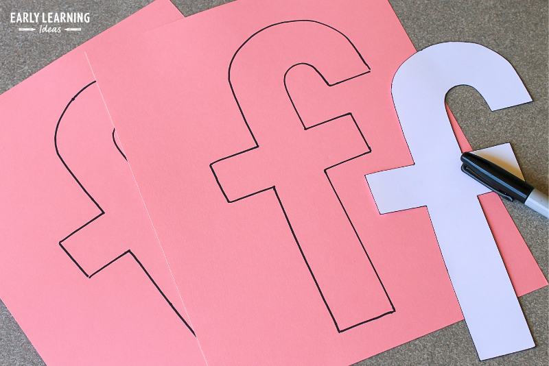 Letter f pattern traced onto pink paper for an alphabet activity