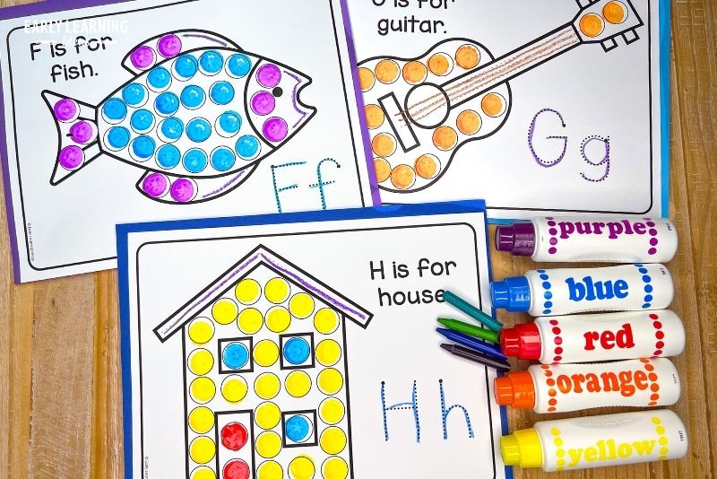 alphabet dot marker printables. A letter h is for house, g is for guitar, and f is for fish dot painting and tracing sheets are shown.