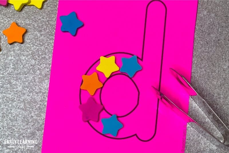 Letter practice cards with mini-erasers and tongs