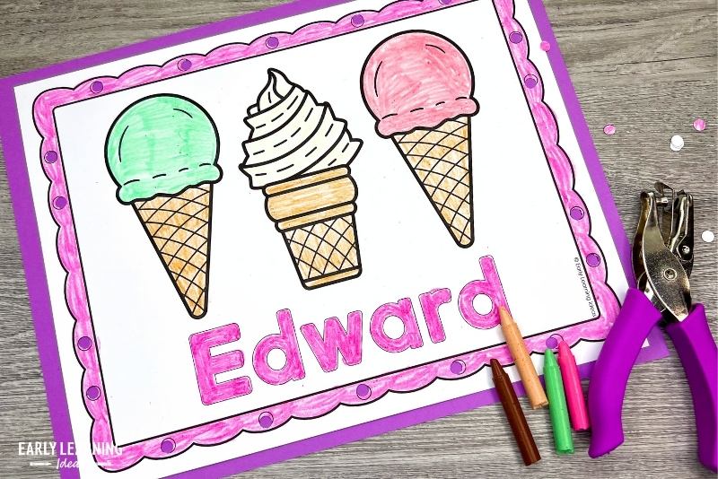 Ice cream name coloring sheet and hole punch activity shown with crayons and hole punch