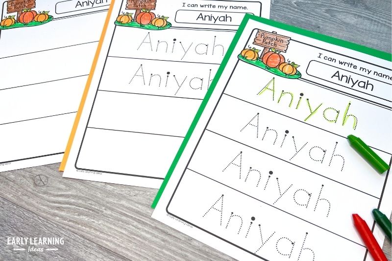 A set of fall pumpkin name tracing activities shown with crayons